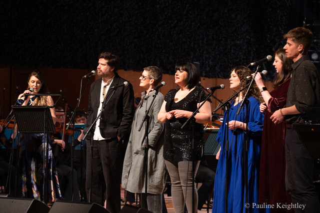 Glasgow Scotland. 18th January 2026. Emily Smith, Kris Drever, Karine Polwart, Fiona Hunter, Janice Burns, Lori Watson, John Doran, Scots folk singers, performed at a Tribute night to Dick Gaughan,True and Bold, at Glasgow concert hall at Celtic Connections 2026. Gaughan is a legend of Celtic folk muisc of 20th century. Handful of Earth. Photo Pauline Keightley